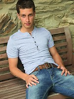 David Newsome stroking his cock outdoors.