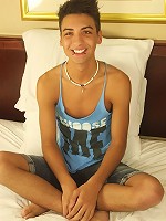 Gorgeous twink Roman Daniels blows his load onto stomach.